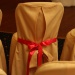 Оформление свадебных стульев тканью и лентами