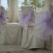 Оформление свадебных стульев бантами